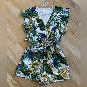 Tropical flutter sleeve romper with front tie. Size small.